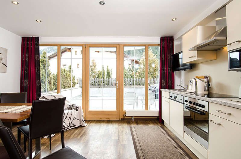 Kitchen and dining area in the Ambiente Apartments in Ischgl