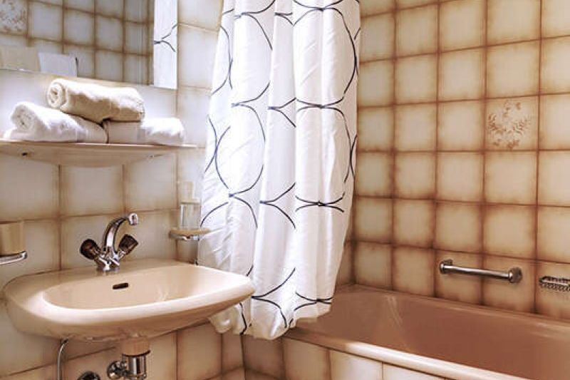 Bathroom with bathtub in Apartment Type C in Versalerhof